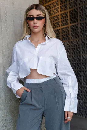 Camisa cropped manga larga con bolsillos